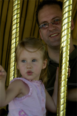 Serene and Daddy on the carrousel