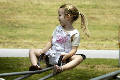 Serene enjoys the seesaw