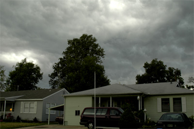 A vortex of evil formed over our neighbors and sucked them in...or tried to...they're fine now...