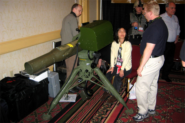 Sande (my co-author) learns how to launch a TOW rocket at the America's Army booth