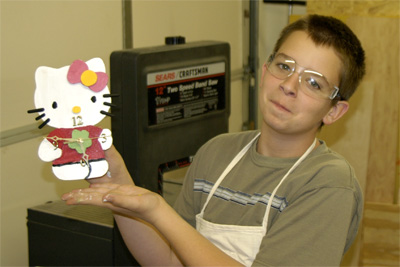 Davis shows off the Hello Kitty Clock, a birthday present for Serene