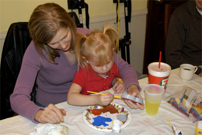 Lillian lets Anita help her paint