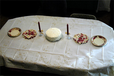 I baked the cake (carrot cake with cream cheese frosting) and Susan decorated the table