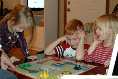 Serene, Harison, and Lillian play a game (Taken by Susan)