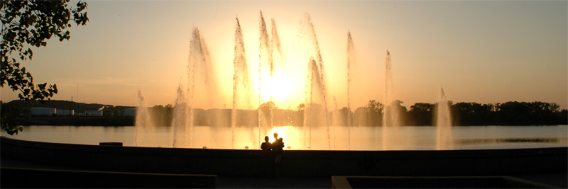 Couple with Child in the Sunset